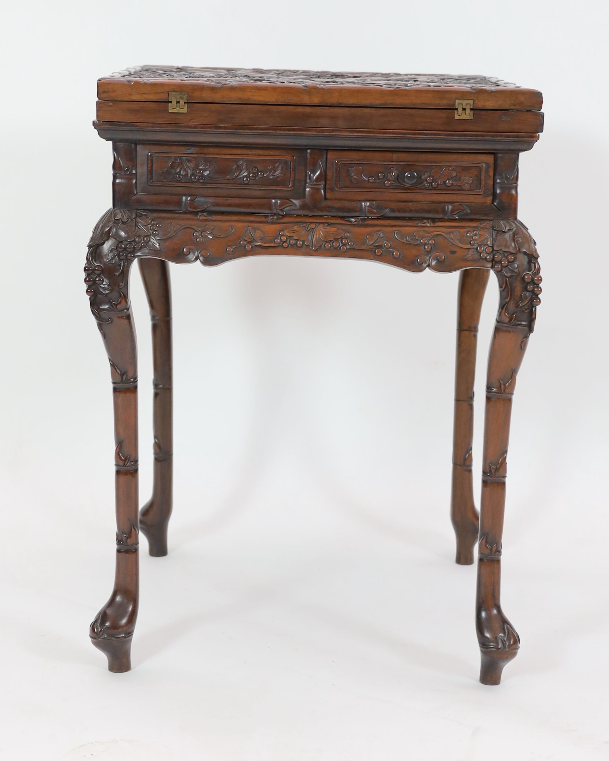 A Chinese hongmu ‘dragon’ envelope card table, c.1910, 55 cm Square, 78 cm high, some splits